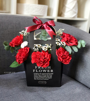Red Roses Flower Bag with White Desi Flowers – Handcrafted Fresh Arrangement
