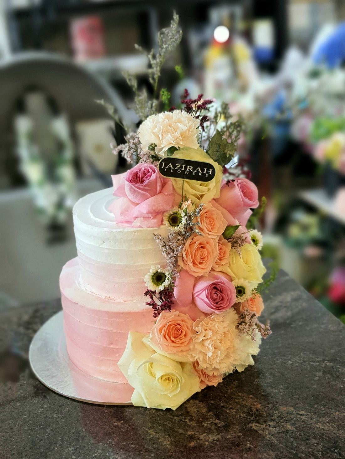 Elegant Floral Cake with Natural Flower Arrangement – Fresh & Handmade by Jazirah Flowers