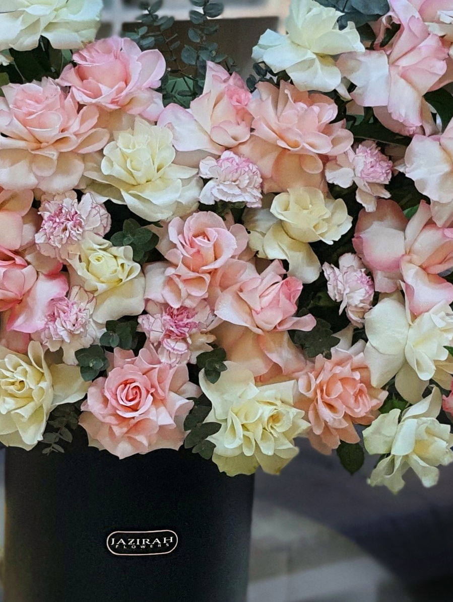 Blush and cream rose bouquet in luxury black box by Jazirah Flowers – romantic flower arrangement