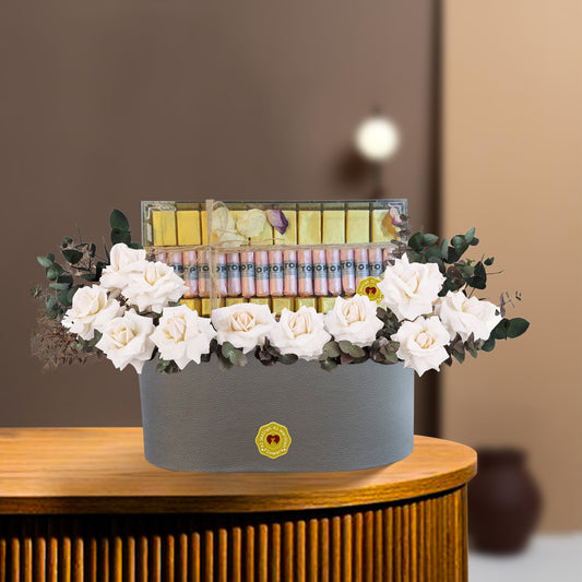 flowers with chocolate in a box, white roes. Flower combo