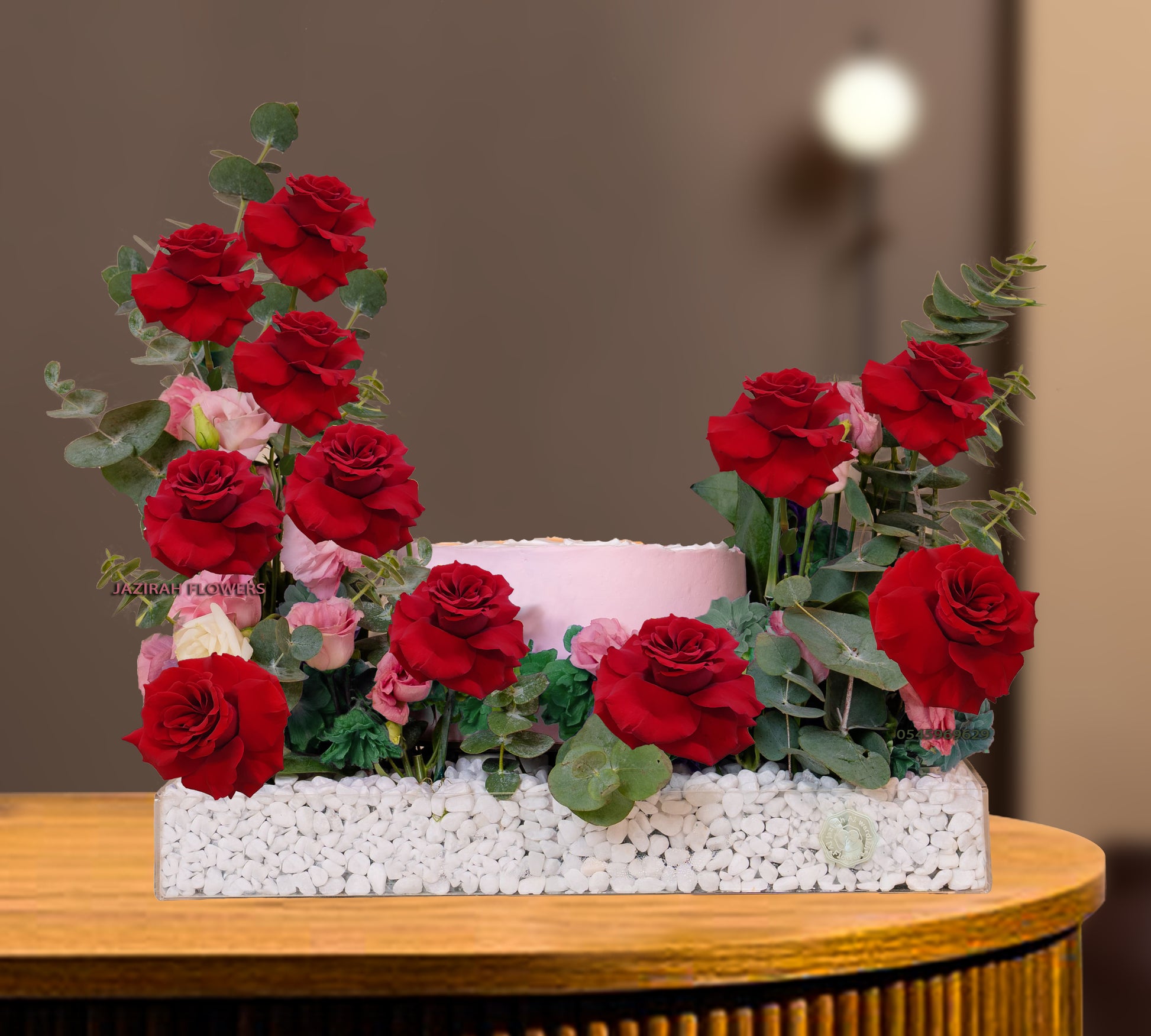 Fresh flower with cake in a tray. red roses arrangement