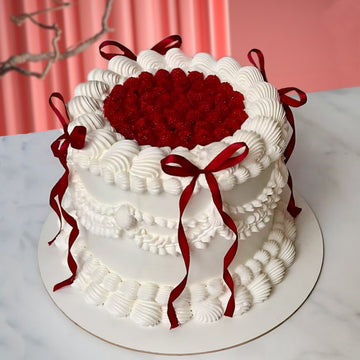 Luxury Heart Berry Cream Cake with Red Ribbons – Romantic Strawberry Cake UAE