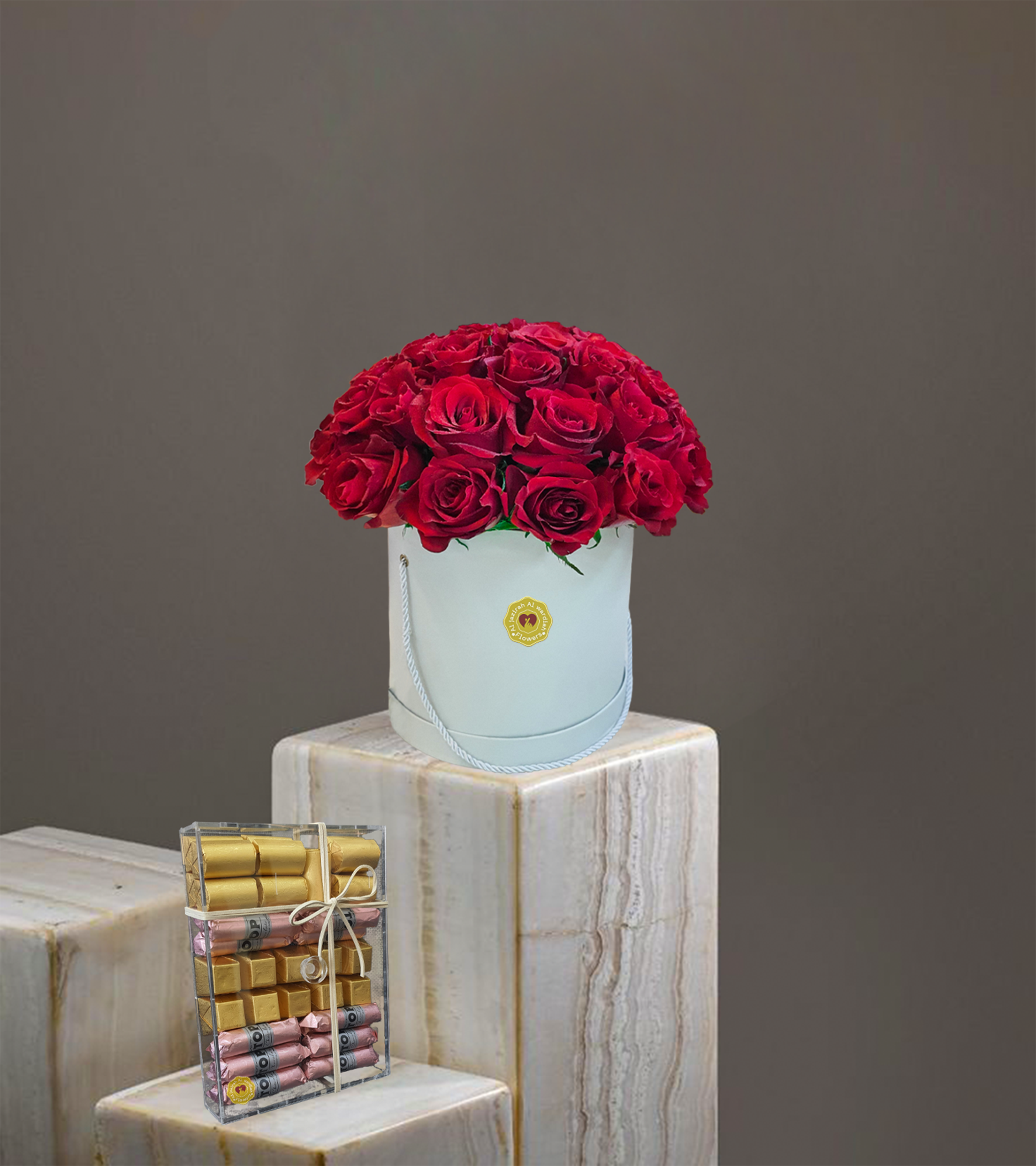 Red Roses Round Box Red roses round box bouquet with chocolate – Jazirah Flowers