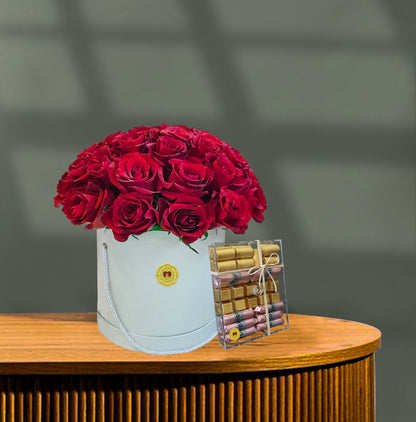 Red roses round box bouquet with chocolate