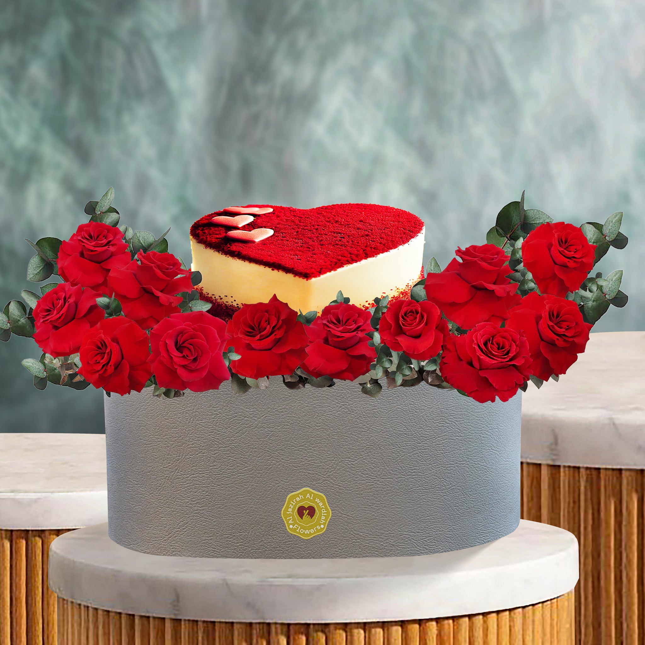 Flowers with cake, red roses with cake in a box