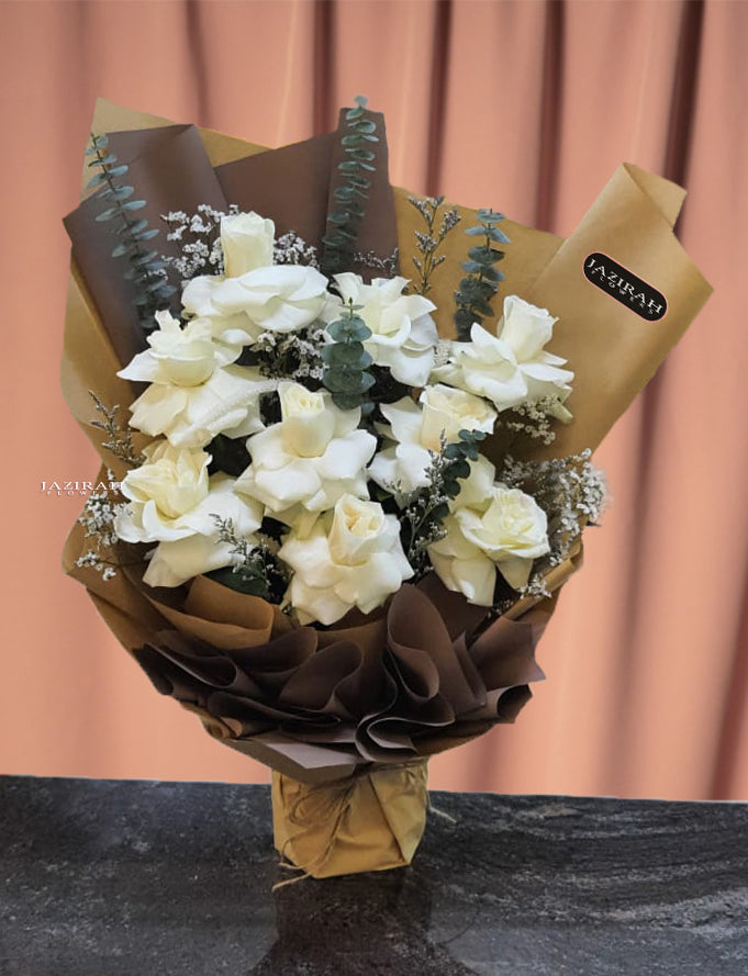 Elegant White Rose Bouquet – Fresh White Roses with Eucalyptus & Rustic Wrapping