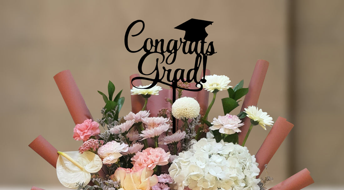 Graduation Flower Arrangement in Luxury Bag – Mixed Fresh Blooms with "Congrats Grad" Topper | Jazirah Flowers