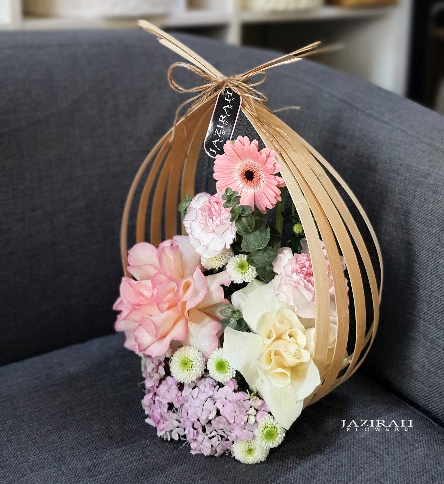 flowers arrangement with bamboo wood stands
