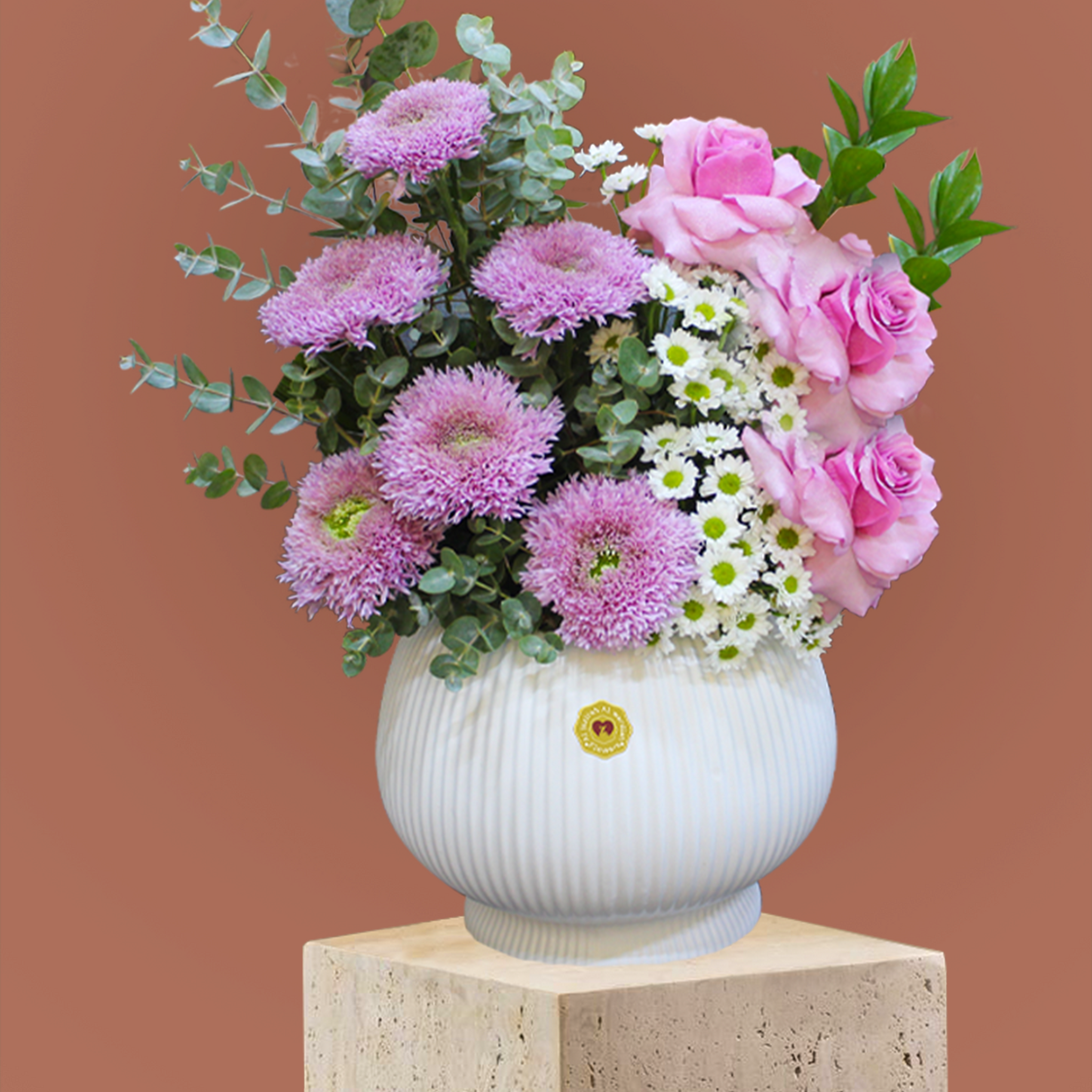 Flower bouquet arrangement with a vase