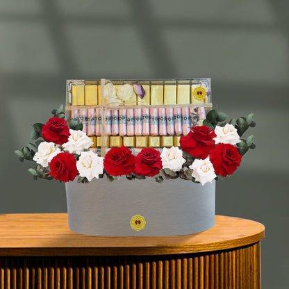 Flowers with chocolate in a tray, fresh flowers red and white