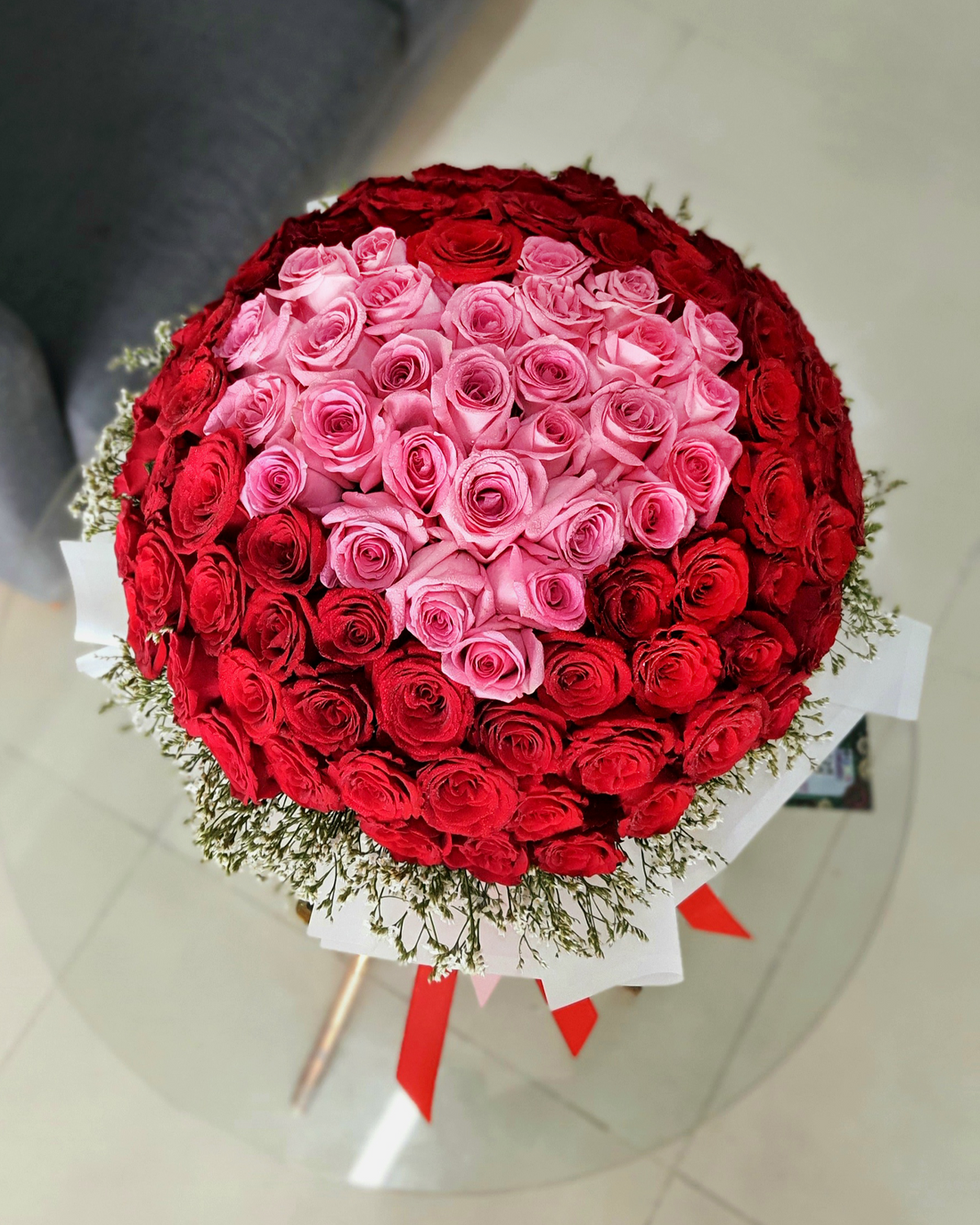 Red Roses Bouquet Inside a Heart of Pink Roses